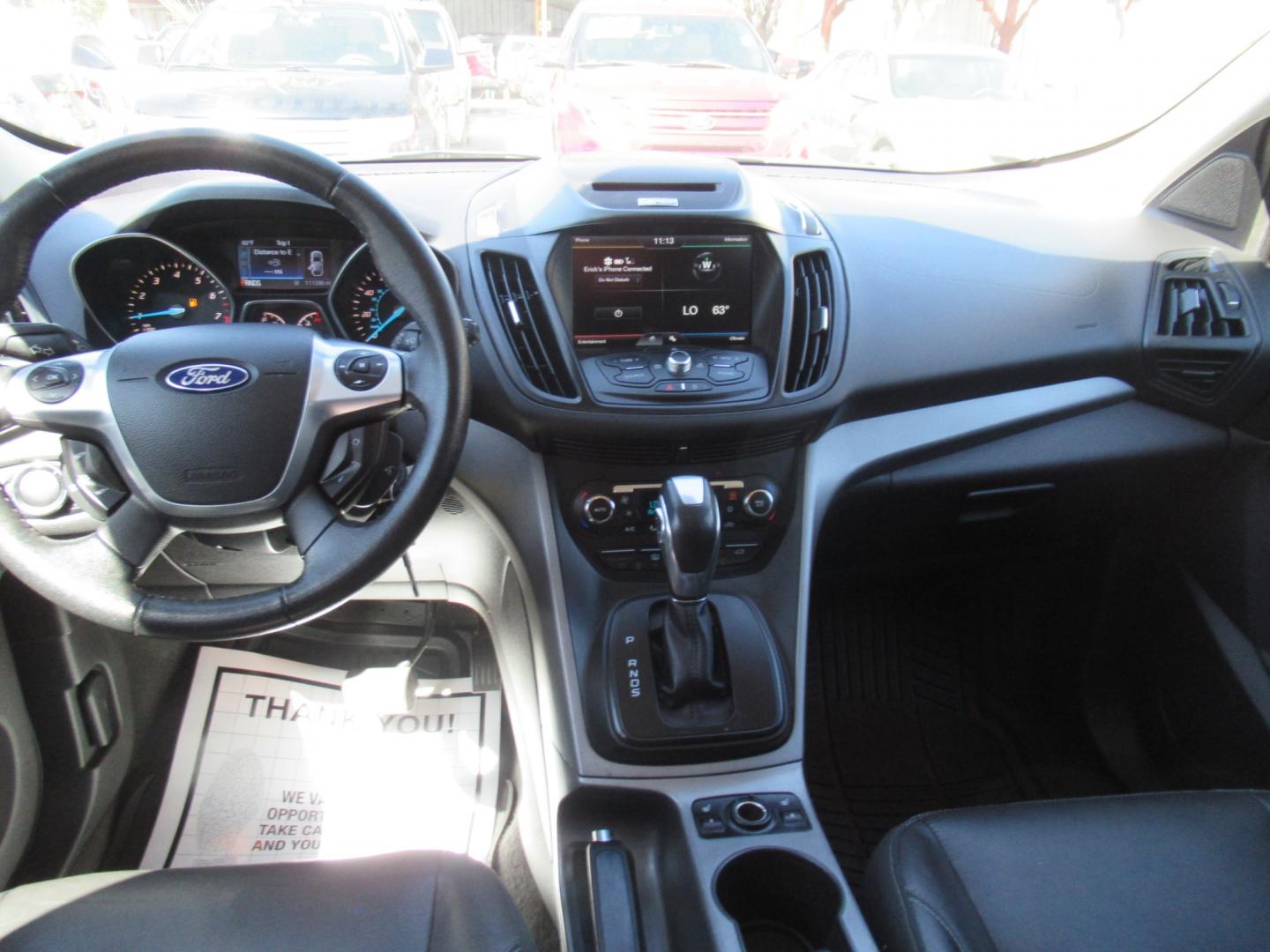 2014 Black /Black Ford Escape SE 4WD (1FMCU9GX5EU) with an 1.6L L4 DOHC 16V engine, Automatic transmission, located at 1511 North Shepherd Dr., Houston, TX, 77008, (281) 657-1221, 29.798361, -95.412560 - 2014 FORD ESCAPE SE VIN: 1FMCU9GX5EUC37295 1 F M C U 9 G X 5 E U C 3 7 2 9 5 4 DOOR WAGON/SPORT UTILITY 1.6L I4 F DOHC 16V GASOLINE FRONT WHEEL DRIVE W/ 4X4 - Photo#4